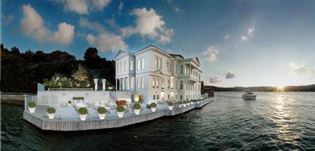A large white haven on a boat in the water.