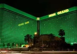 The MGM Grand hotel and casino in Las Vegas is lit up in green, offering VIP treatment.