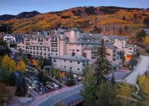 Aerial view of a hotel at dusk in Colorado featuring the Beaver Creek Lodge.