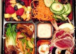 A bento box with various food options.
