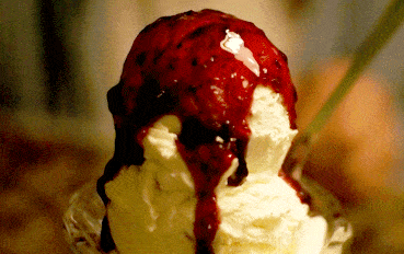 A sundae with a scoop of America's Best Ice Creams and a spoon.