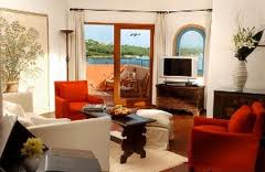 A living room with a view of the ocean that you will always cherish.