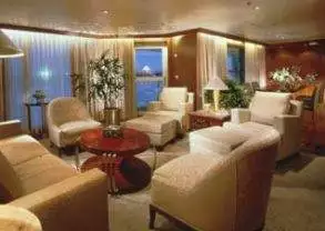 A luxurious living room on a Celebrity Millennium Cruise.