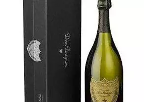 A bottle of 1966 Dom Perignon champagne sold at $1,965 with a box in front of it.
