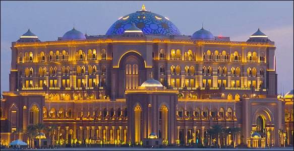 Emirates Palace hotel in Abu Dhabi at dusk.