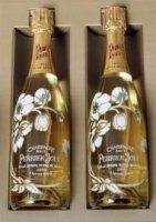 Two bottles of Perrier-Jouet champagne in a box, setting the mood at parties.