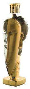 A gold vase with a woman's head on it, inspired by Modigliani.