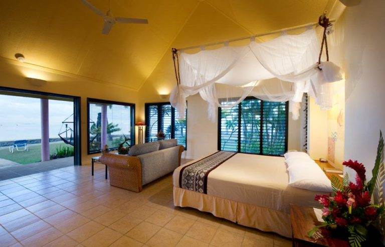 A bed or beds at a resort inspired by the island lifestyle at Fiji Hideaway Resort & Spa.