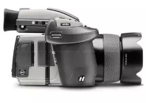 A black and white camera with a lens attached for real photography.