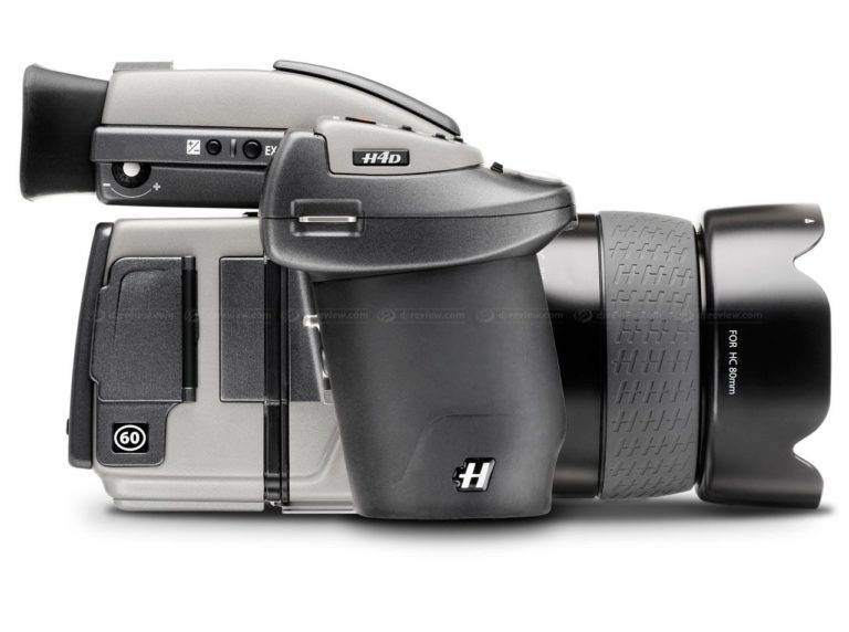 A black and white camera with a lens attached for real photography.