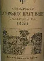 A bottle of wine with a label on it, showcasing Mission Haut-Brion.