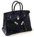 A hermes birkin bag on a white background, proudly exclusive.