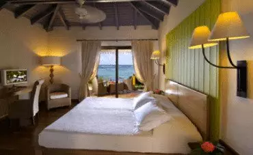 A room with a view of the ocean at Hotel Guanahani & Spa.