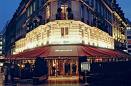 An image of Hotel Fouquet's Barriere at night in Paris.