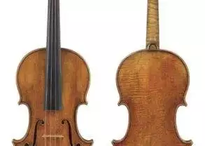 Lady Tennant Stradivarius violin with a bow, played alongside another violin.