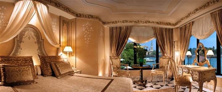 An ornate bedroom with an ultimate luxury experience.