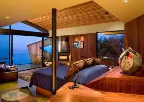 Have a romantic getaway at Post Ranch Inn, a bedroom with a view of the ocean.