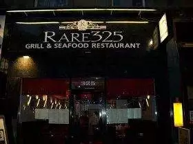 A restaurant with a sign that says rare 25 seafood restaurant.