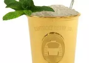 Try a Mint Julep to Commemorate an Auspicious Occasion with a gold cup and ice.